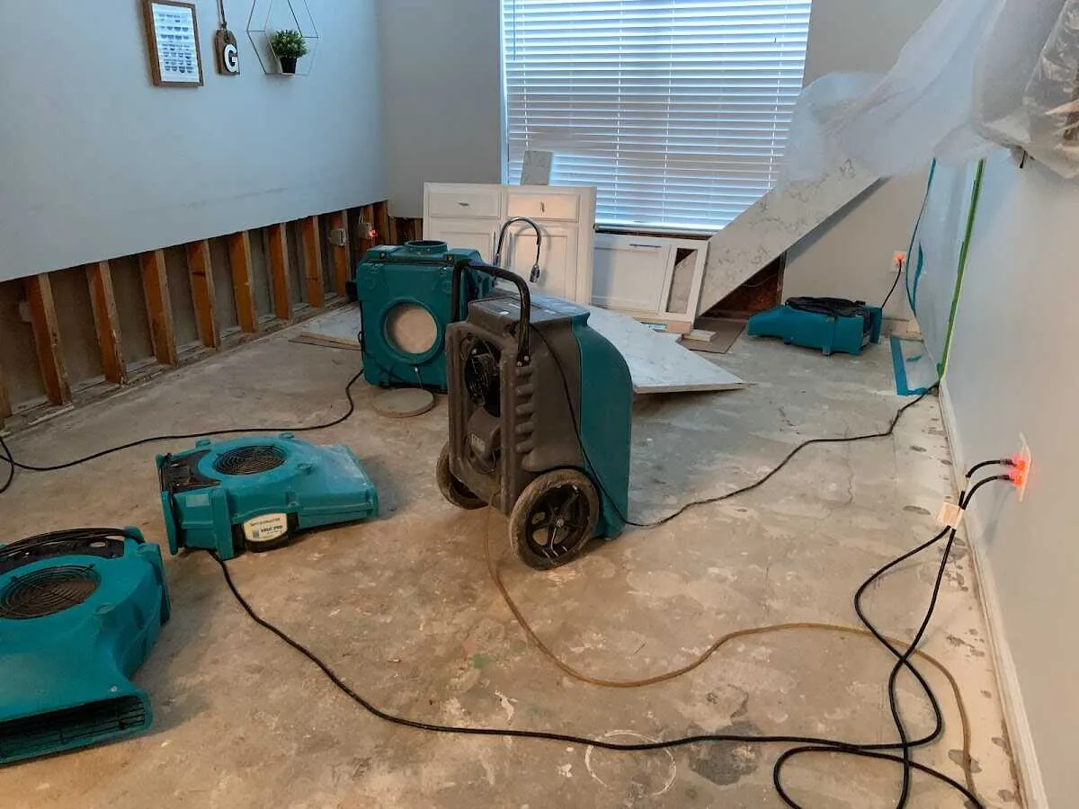 Dehumidifier in flood-cut room for Water Damage Restoration in Slaton
